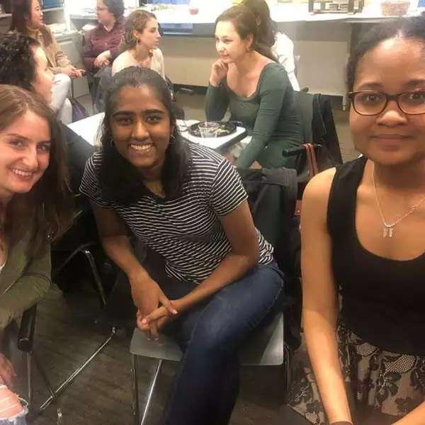 Young women of color at a networking event